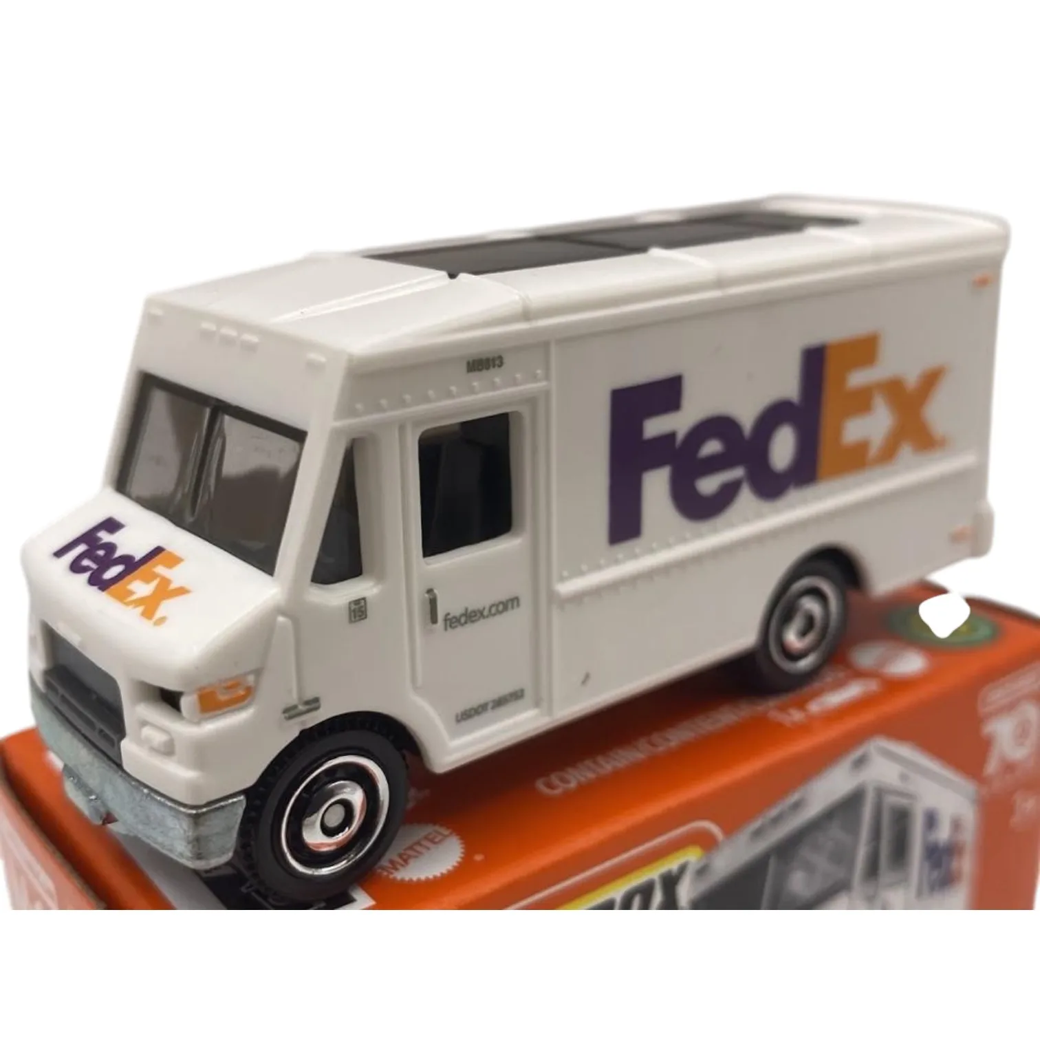 Matchbox, Express Delivery Fdx Hlf03 Modèle réduit de camionnette de transport, conçu pour le transport et la livraison de colis urgents, échelle 1:60-64 environ, miniature en métal moulé sous pression, collection Mbx 70 Years, sans emballage, emballage boîte d'origine