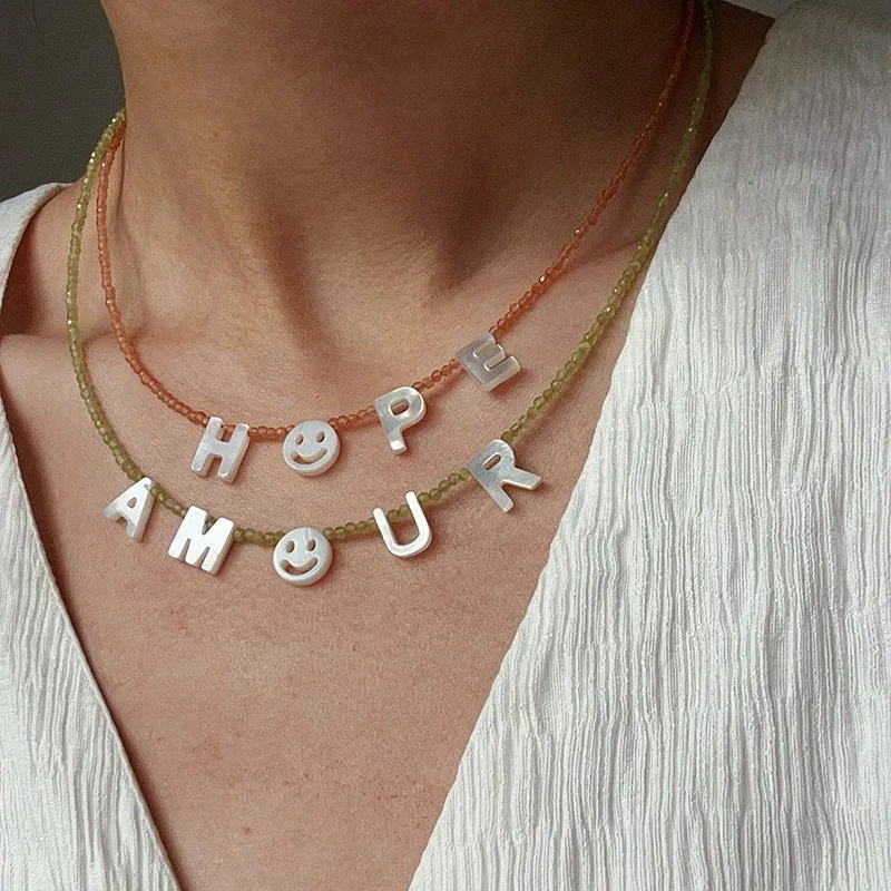 

DOREMI Personalized letter pendant colorful bead necklace women's simple white shell smiling face DIY collarbone necklace