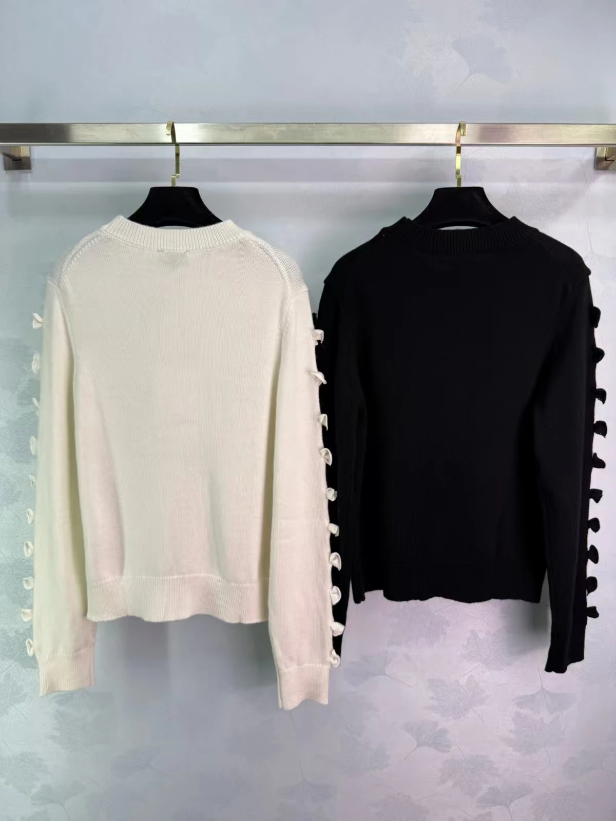 

2025 Autumn New Solid Color Bowknot Women's Knitted Cashmere Sweater Fashion Soft O-Neck Collar Hollow Design Top A3