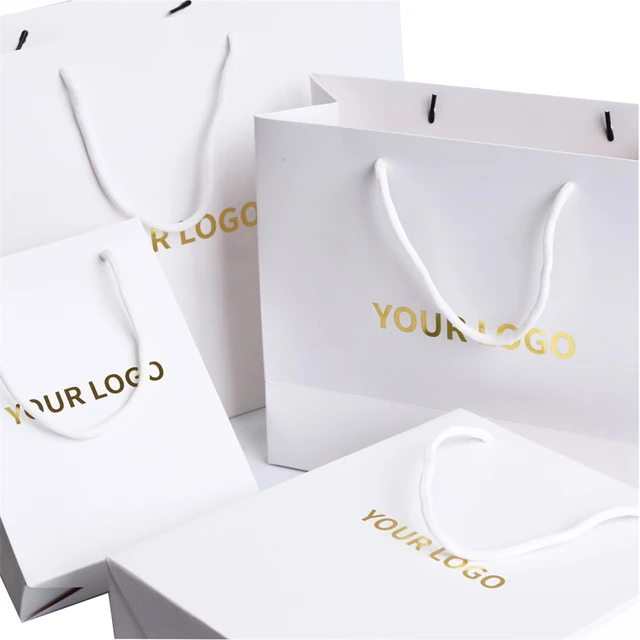 Bolsas de compras personalizadas para ropa diseno de logotipo impreso en oro embalaje de papel de carton blanco para venta al por menor 500 Uds. lote AliExpress