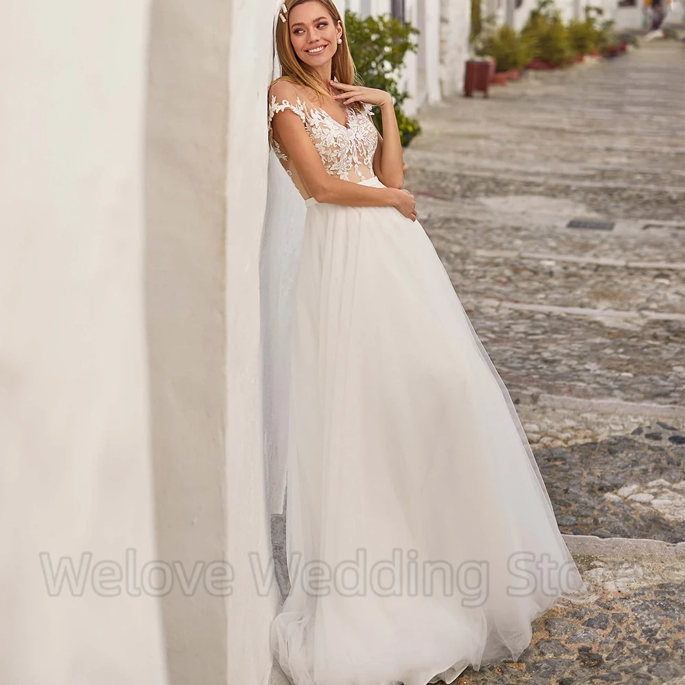 Vestido De novia De manga corta con cuello en V, apliques De tul, línea A, longitud hasta el suelo con cinturón, ilusión Sexy, personalizado