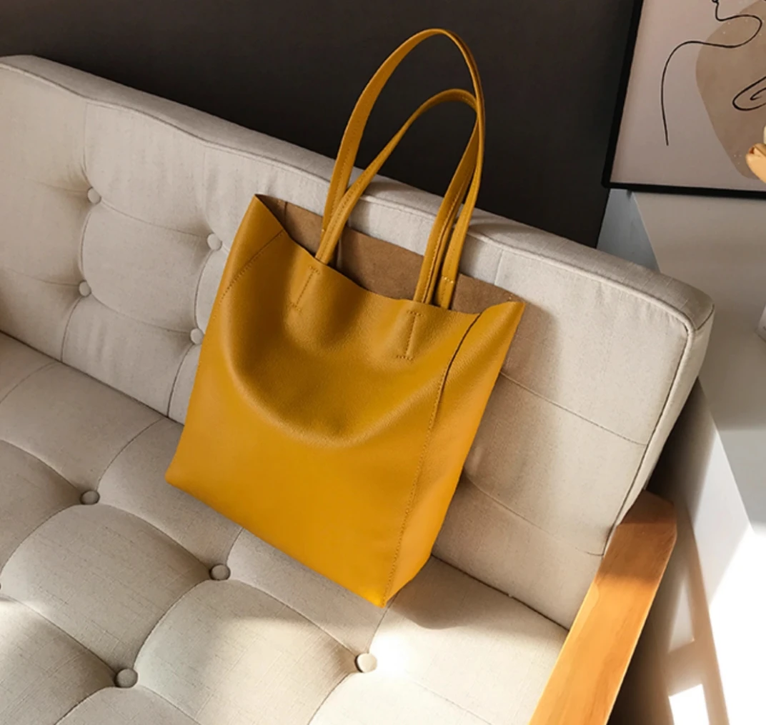 

Vertical yellow genuine leather tote bag for women large capacity first layer cowhide casual lazy shoulder bag