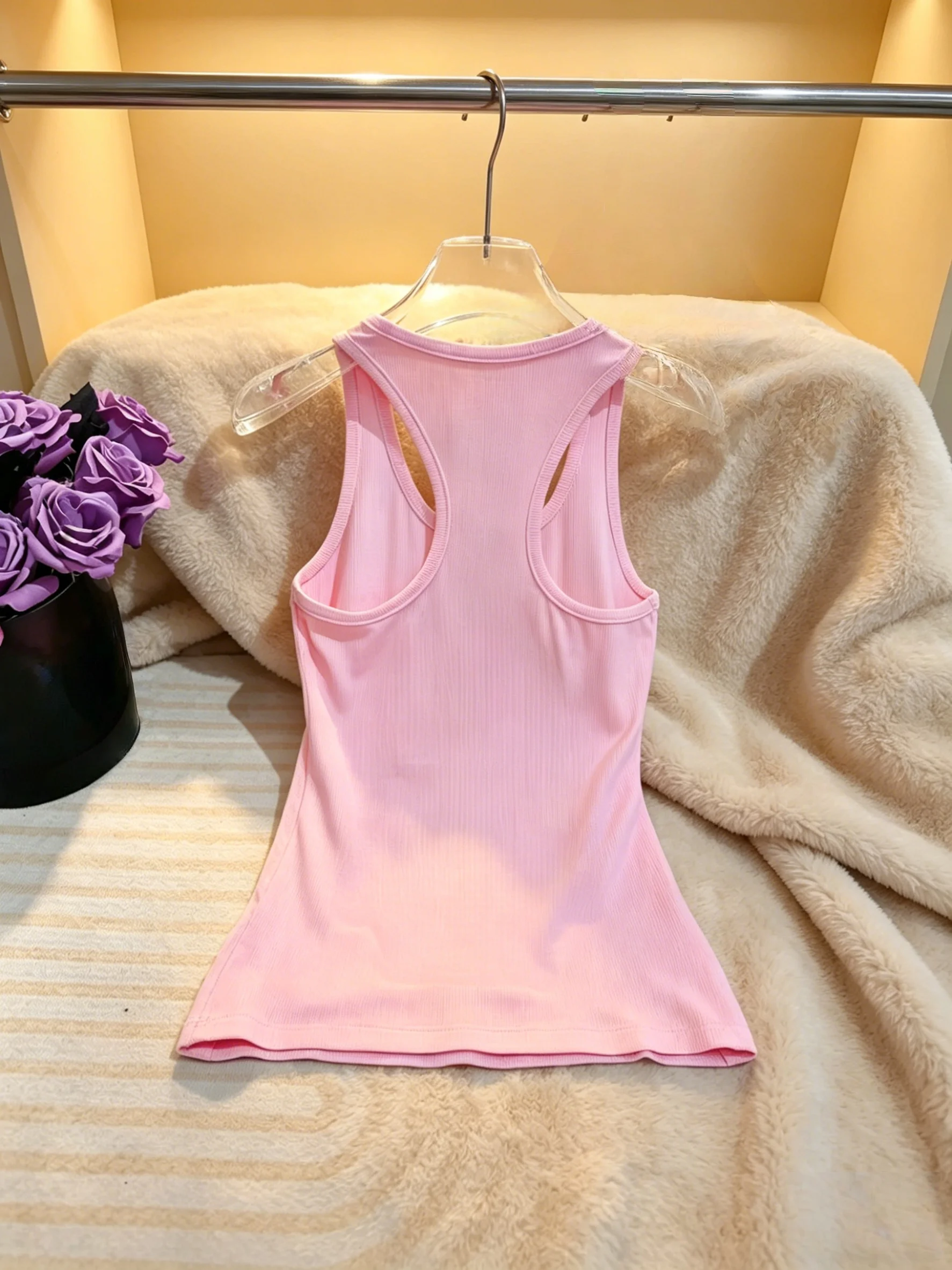 

Женская модная футболка без рукавов средней длины