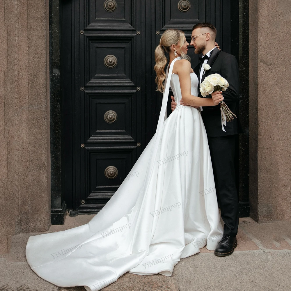 فساتين زفاف أنيقة من الساتان المطرز بدون أكمام بدون حمالات على شكل حرف a بدون أكمام سويب تراين فساتين العروس مع شالات مخصصة #1