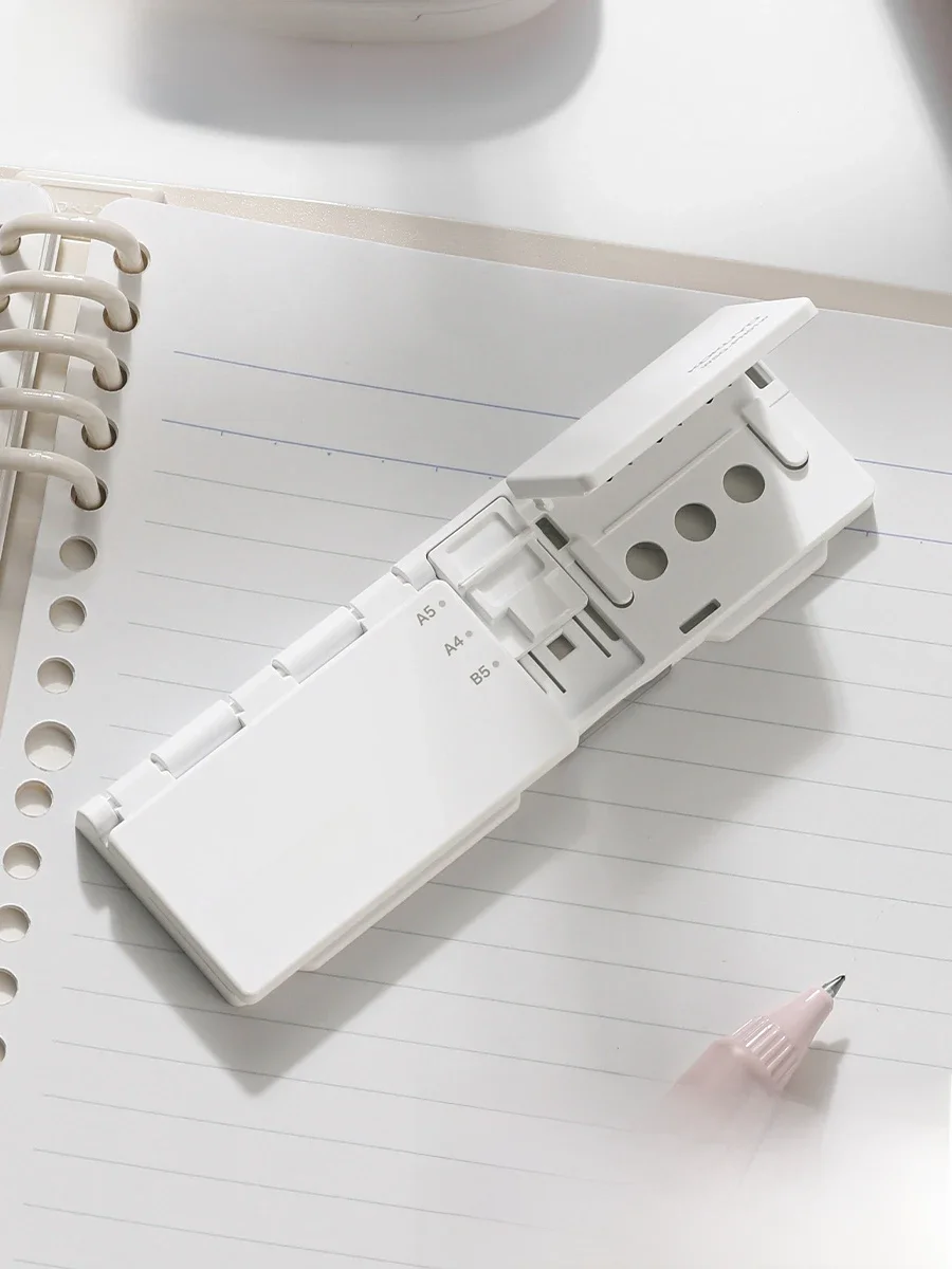 Japan Kokuyo Precision 8 otworów Dziurkacz do segregatorów Przenośny ręczny segregator biurowy Specjalny do dziurkowania papieru z luźnymi kartkami — zdjęcie produktu 6