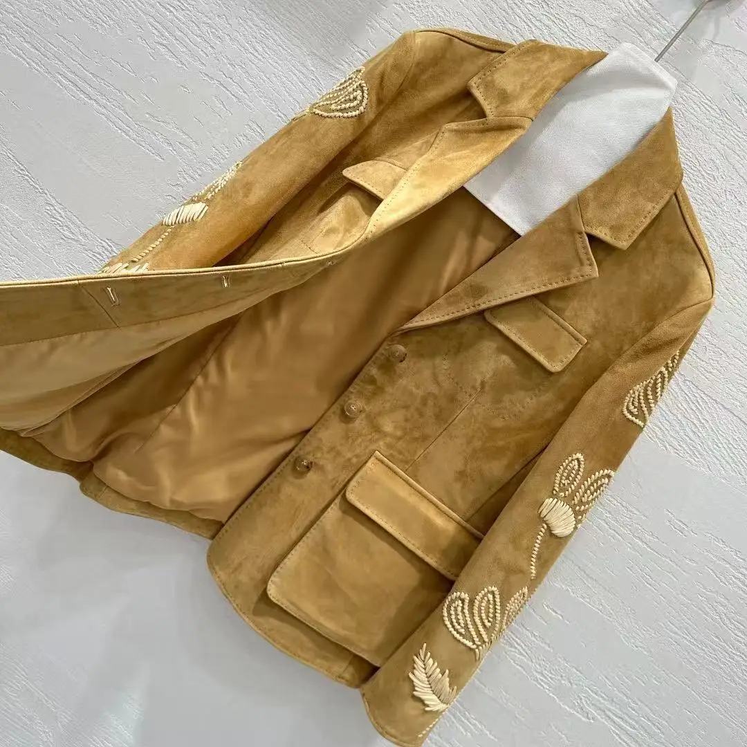 Hoogwaardig leren jack met handhaakborduurwerk