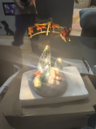 Animated Christmas Village Flying Sleigh with Rotating Santa Figurines Musical Light-Up Holiday Decorations Accessory photo review