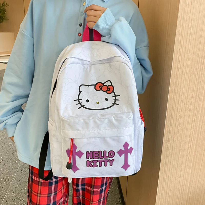 サンリオ ハローキティ 大容量学生リュックサック トレンディなプリントデザインと背面に隠しジッパーバッグ付き