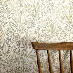 Watercolor Painted Nocturne wallpaper with Botanic Branches and Leaves with a green white light back