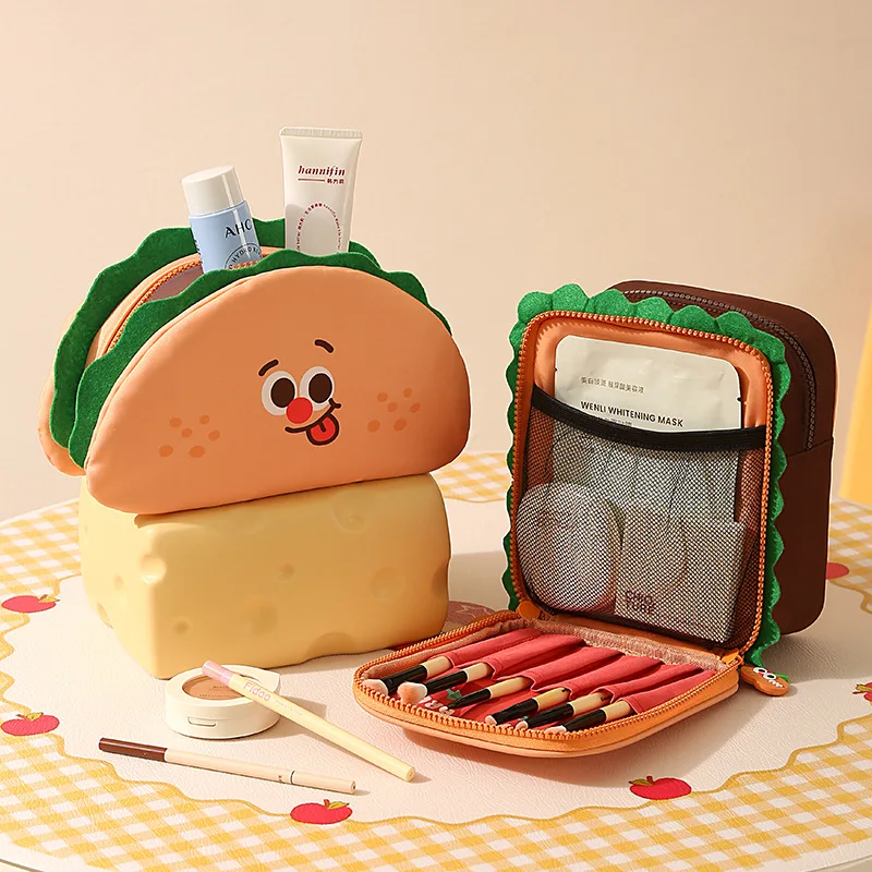 Taco and Toast-Shaped Makeup Bags Perfectly Combine the Fun and Cuteness of Food with Practical Storage. The Inner Layer Has a Mesh Pocket and Pen Slot, Which Can Organize Makeup Brushes, Skincare Samples, Eyeshadow Palettes, and Other Beauty Products, Making It Easy to Store Your Entire Makeup Set for Short Trips. The Whole Piece Is Made of Soft and Elastic Fabric, Feels Soft and Cuddly, and Is Both a Practical Storage Bag and a Playful Accessory, Perfect for Girls Who Like Cute Styles.