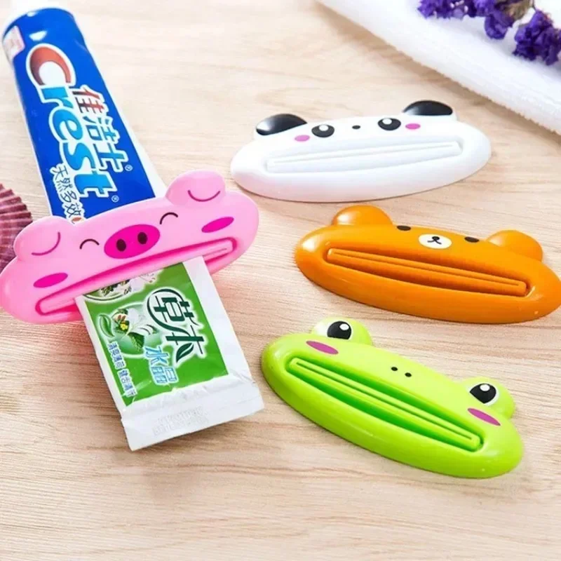 Cute Cartoon Rolling Toothpaste Squeezer Dispenser Facial Cleanser Clips Kid Toothpaste Holder Tube Saver Akcesoria łazienkowe — zdjęcie 2
