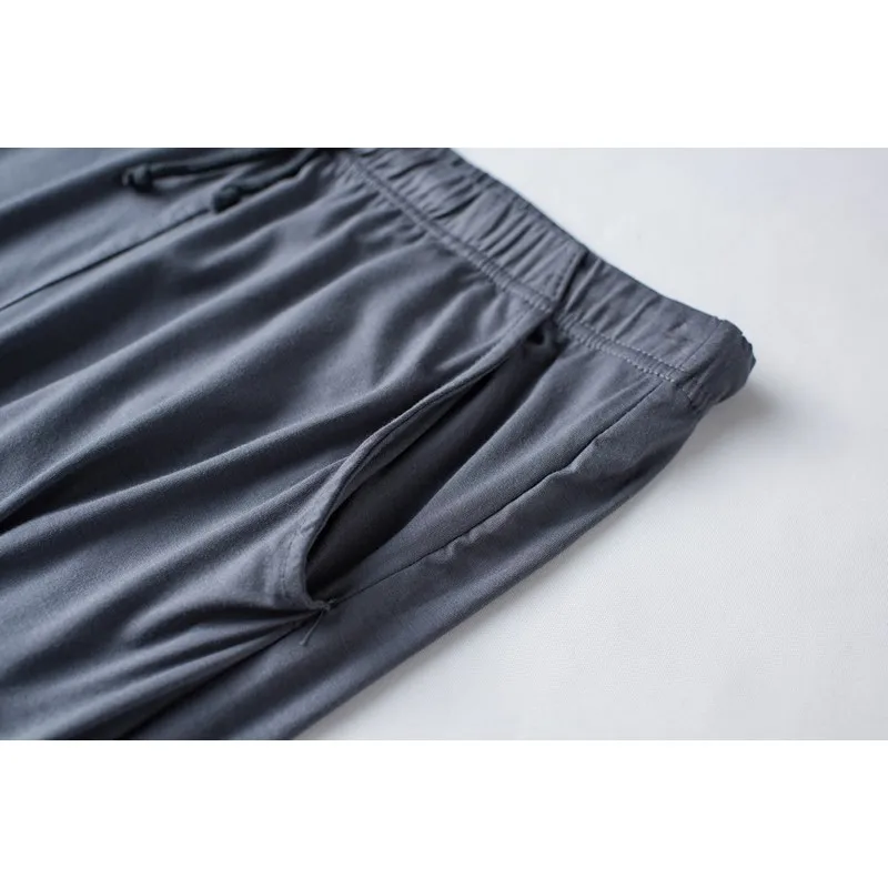 Pijamas modales de dos piezas para hombre, pantalones de manga corta, delgados, talla grande, ropa de casa deportiva suelta, traje de ropa de dormir, primavera y verano, nuevo