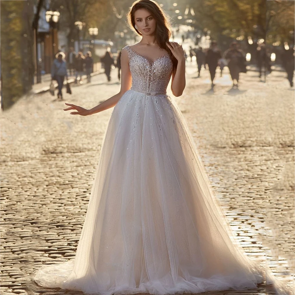 Vestidos de novia elegantes personalizados, sin mangas, Sexy, escote en forma de corazón, tren de barrido, diseño de botones en la espalda, bonito vestido de novia con lentejuelas