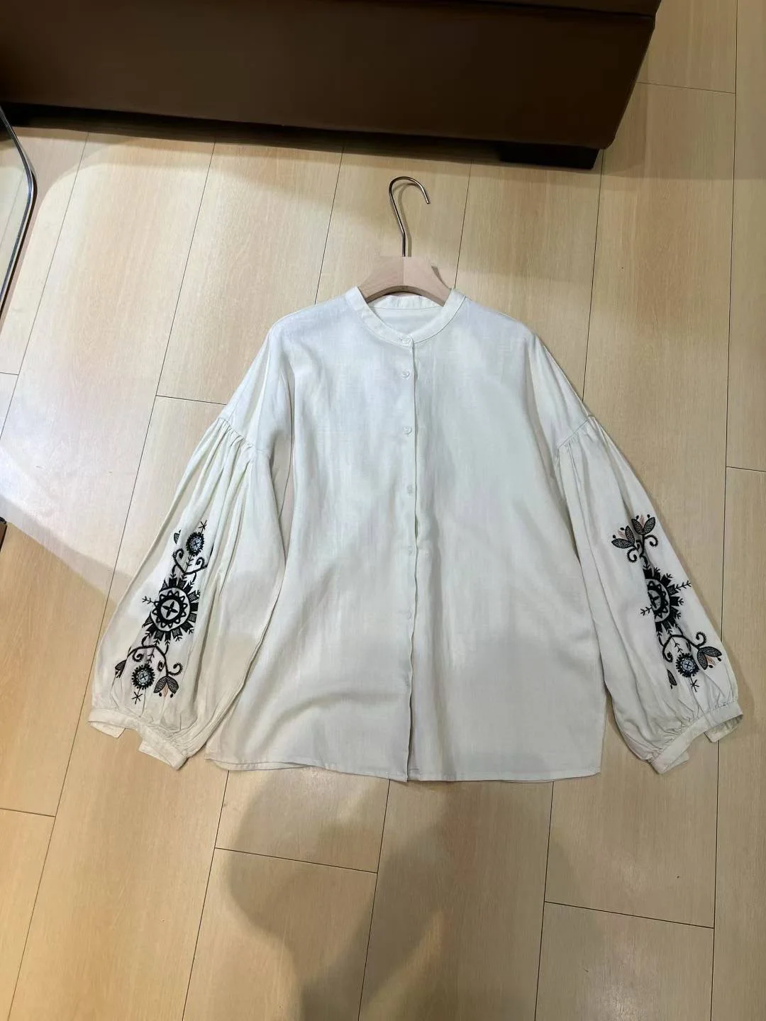 

Elegant casual women's linen blouse with exquisite embroidery