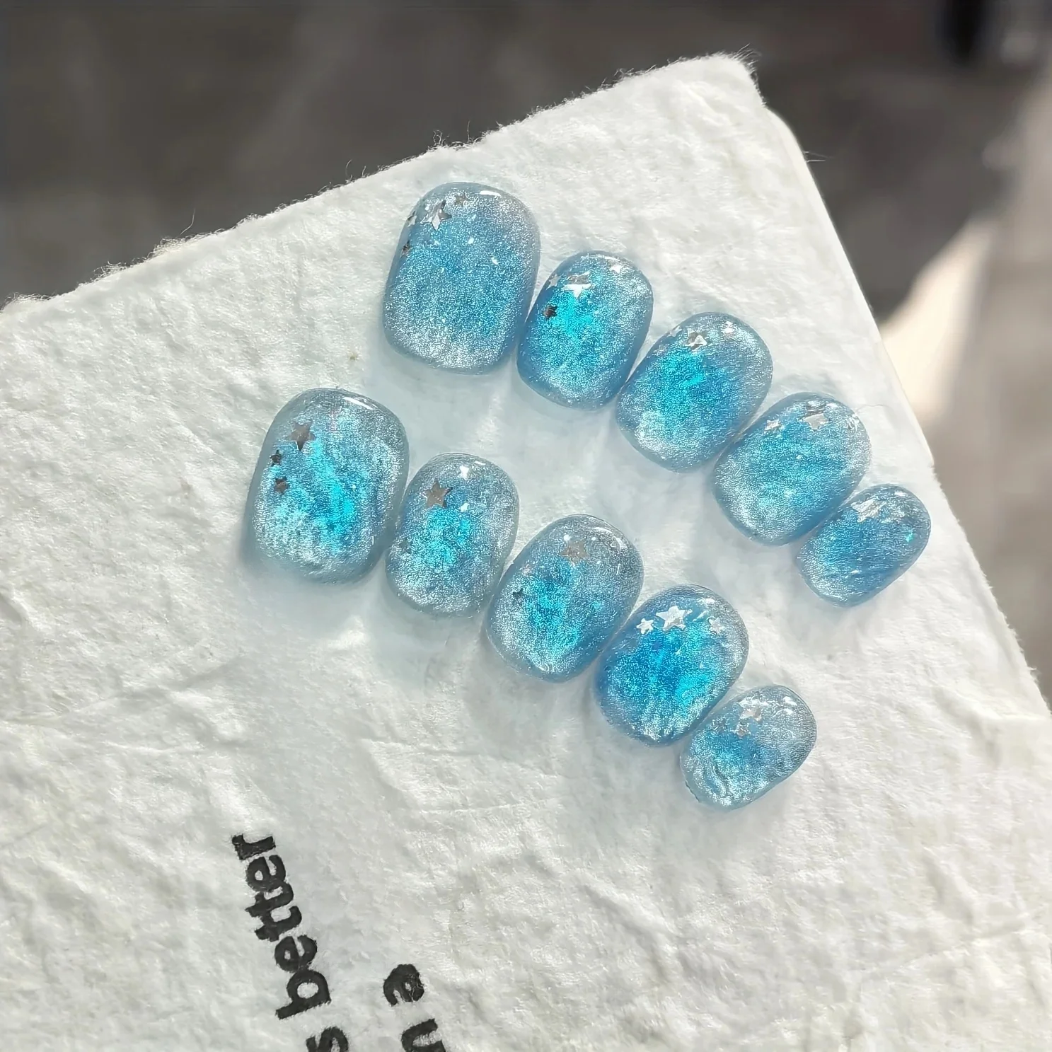 Faux ongles à pression faits à la main, bleu glace, étoile d'océan, Texture transparente, pour femmes et filles, courts, ovales, portables, 10 pièces