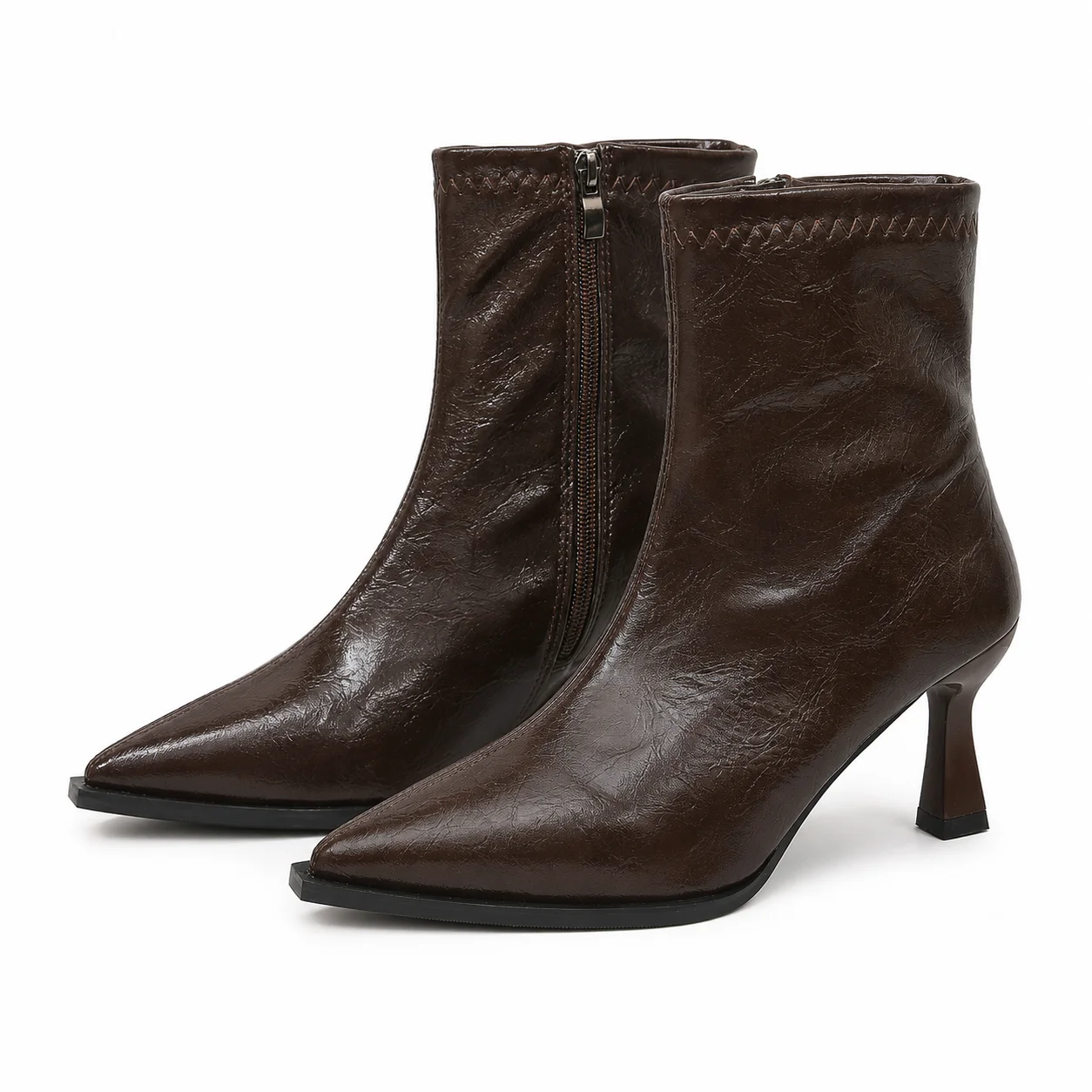 Luxurious women's high-heeled ankle boots with a pointed toestylish, sexy, and elegant footwear suitable for all seasons.