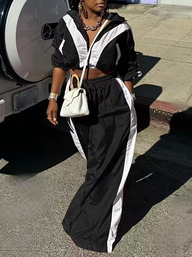 

Женский комплект-двойка: укороченный топ с длинными рукавами на молнии, широкие брюки с эластичной резинкой на талии и шнурком, осенний стиль (черный).