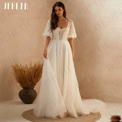 JEHETH Trouwjurken Boho Vintage Half Mouwen Tulle Beach Bruidsjurk Vestidos De Novia Boda Civiele Backless Kant Appliques Trouwjurken Boho Vintage Halve Mouwen  Tule Strand Bruidsjurk Vestidos De Novia Boda Burgerlijke
