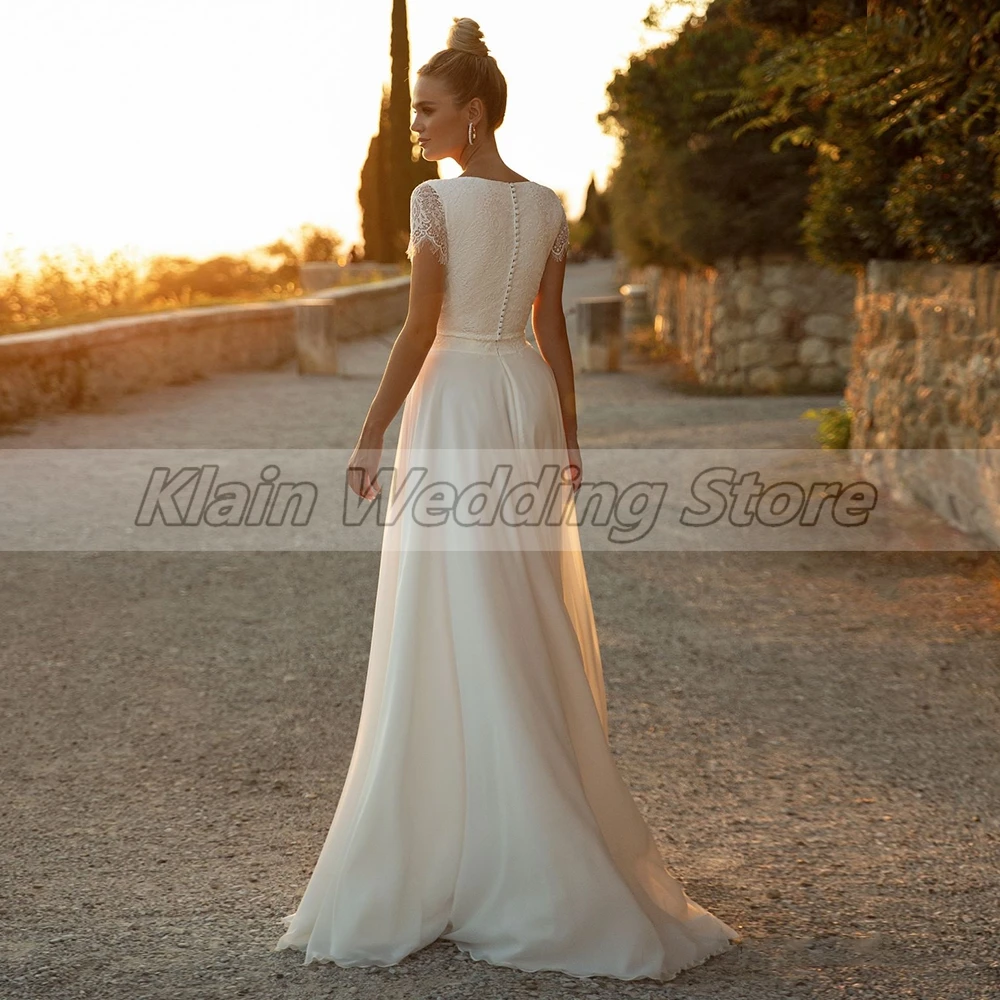 Abito da sposa elegante a maniche corte in chiffon a trapezio personalizzato per le spose 2023 Abiti da sposa classici in pizzo con o-collo e bottoni sul retro Vestid