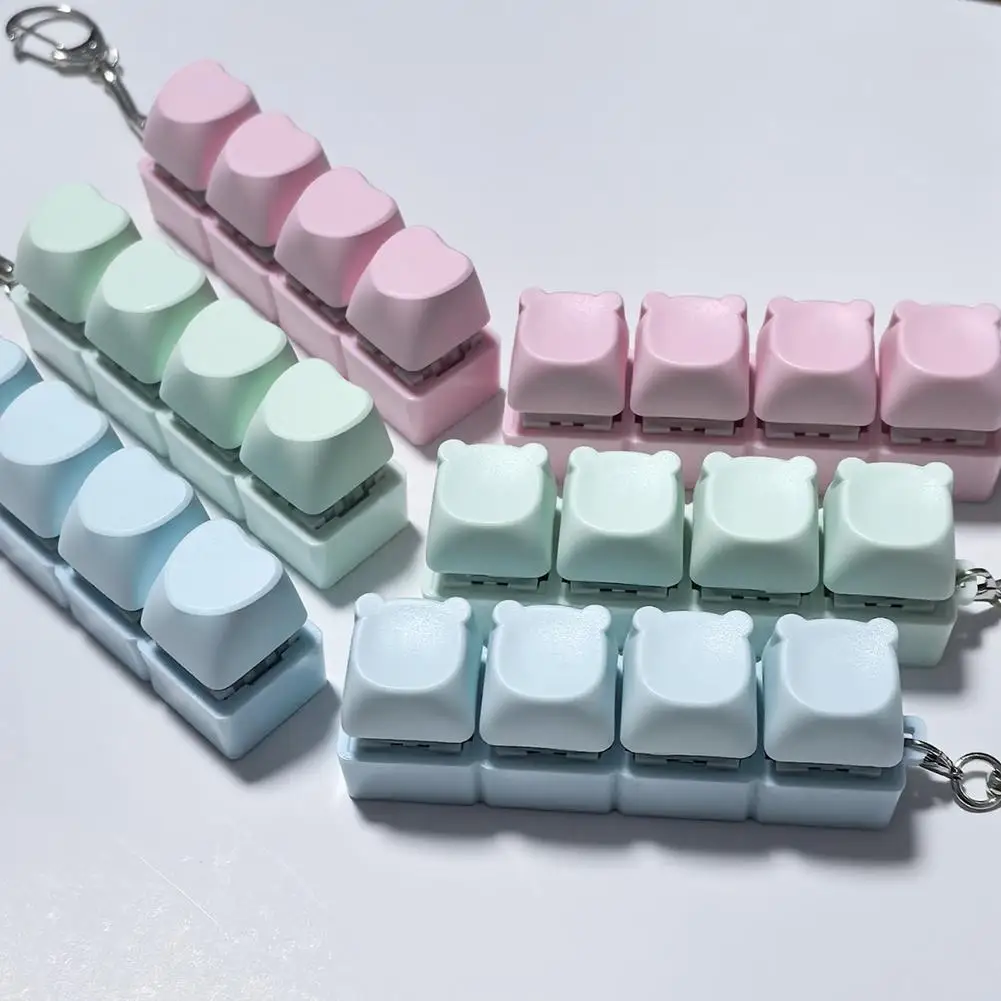 ของเล่นคลายเครียด 4 ปุ่ม คีย์แคปแบบกดนิ้ว ของเล่นบีบคลายเครียด พวงกุญแจ ของขวัญสำหรับเด็กและผู้ใหญ่