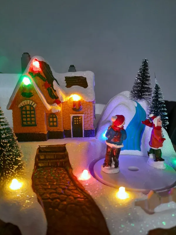 Christmas Village House Lighted Musical Christmas Scene Rotating Skating Figures Snowy Village Collection Tabletop Holiday Decor photo review