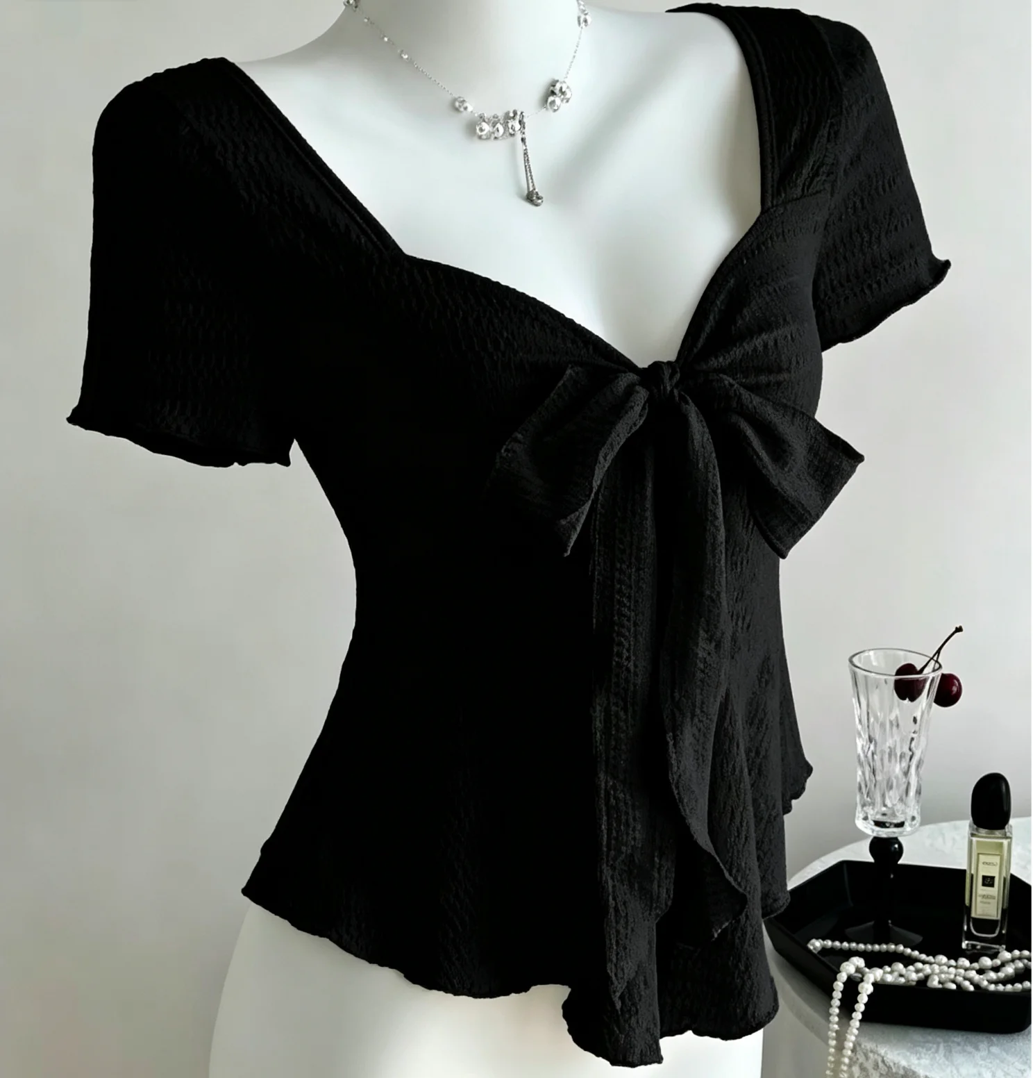 Women's Sweetheart V-Neck Short Sleeve Blouse Front Big Bow Tie Ruched Textured Slim Fitted Peplum Crop Top for Casual Occasions