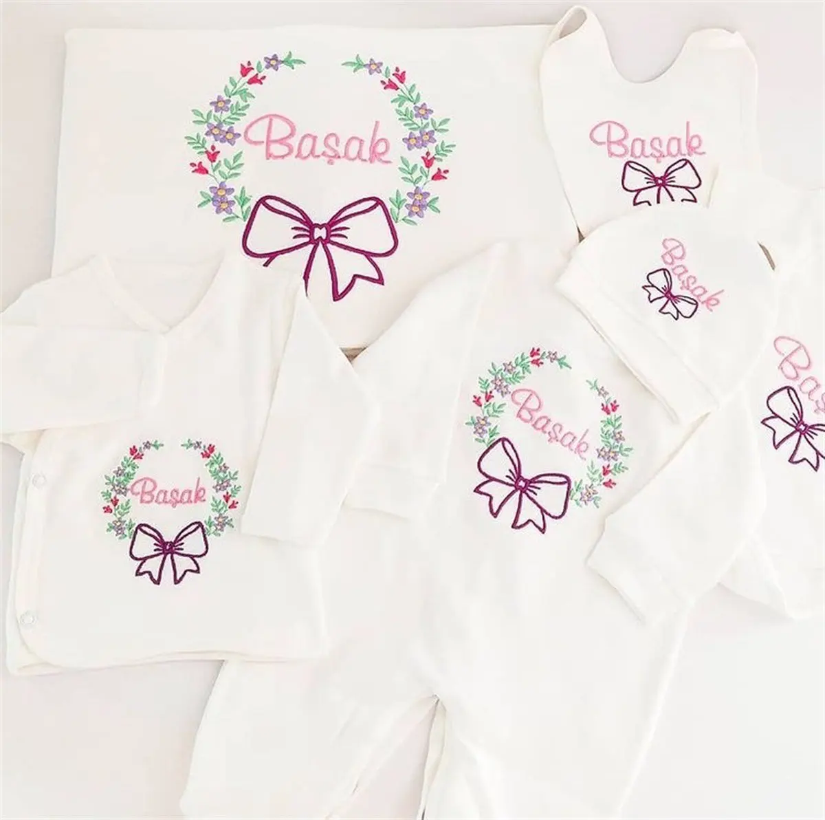 

Bow and Name Embroidered Baby Newborn Set