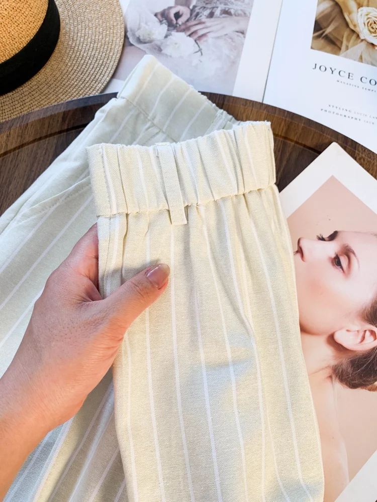 Dames abrikoos gestreepte elastische taille wijde pijpen broek Y2k Koreaanse geavanceerde gevoel gedrapeerde rechte pijpen casual kantoormeisjesbroek