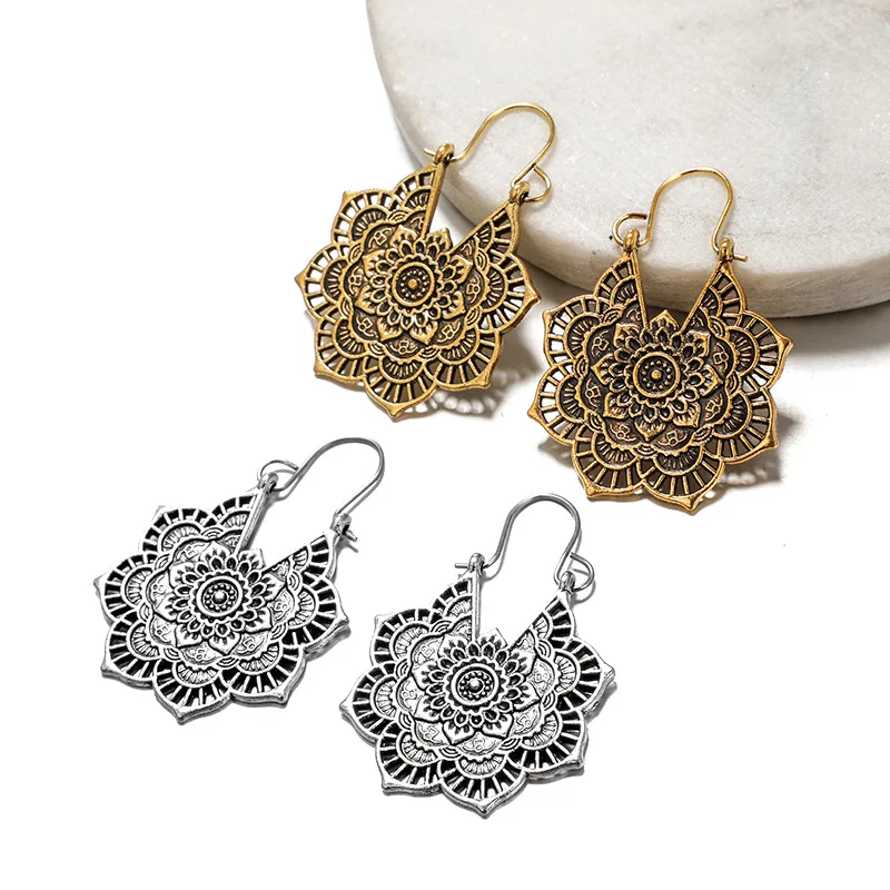 National Wind Earrings Exquisite Retro Metal Hollow Flower Earrings Bohemian Carved Aristocratic Earrings Ladies Custom Jewelry