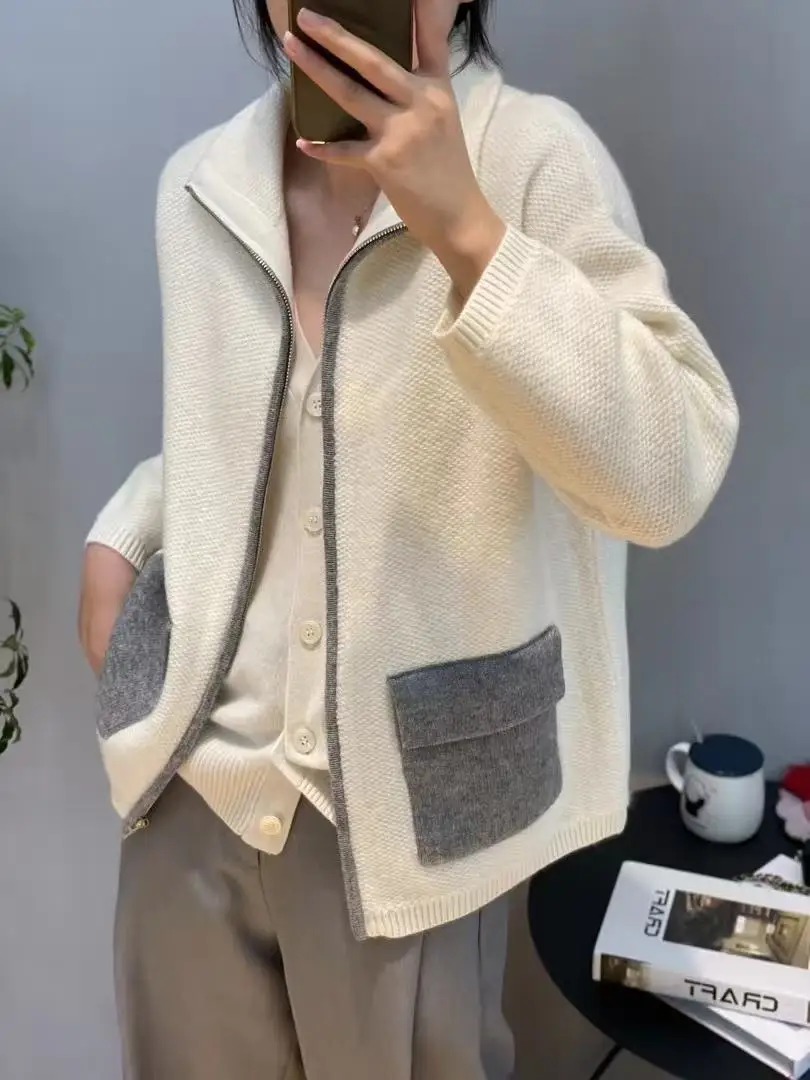 

Elegant pure cashmere cardigan with front pockets