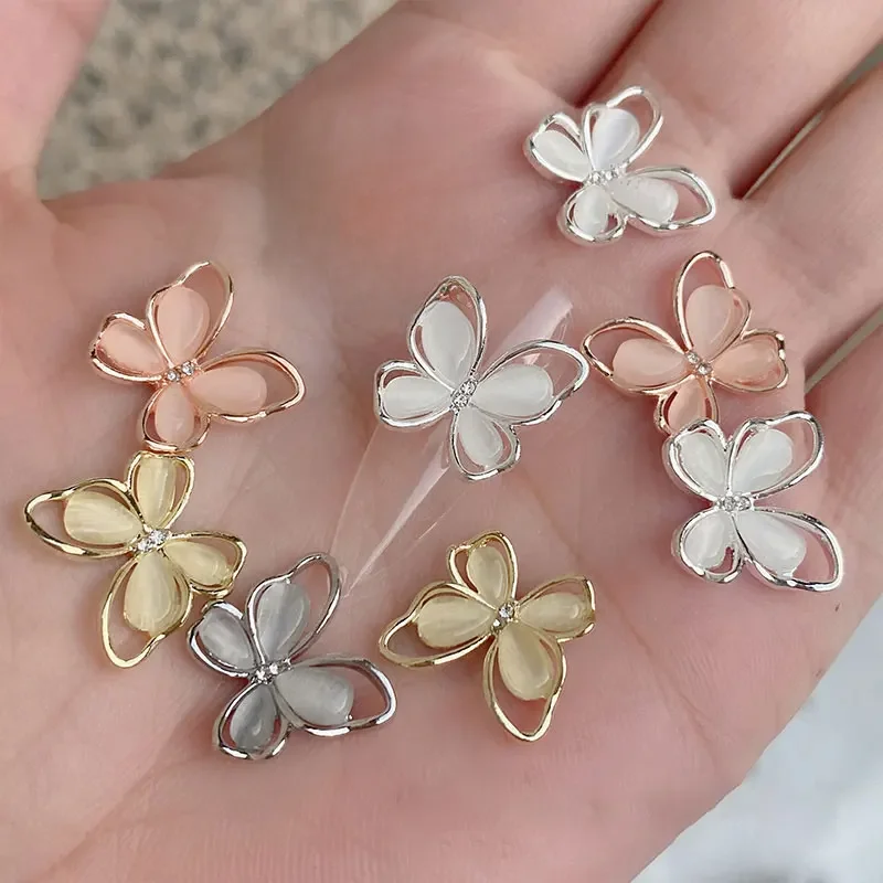 10/20 pièces argent blanc cristal papillon ongles breloques 3D creux oeil de chat alliage Zircon ongles gemmes luxe diamant papillon ongles charme