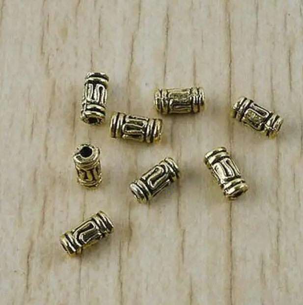 100pcs 6.5*3.1 hole :1.4mm Columniform Spacer bead h2907