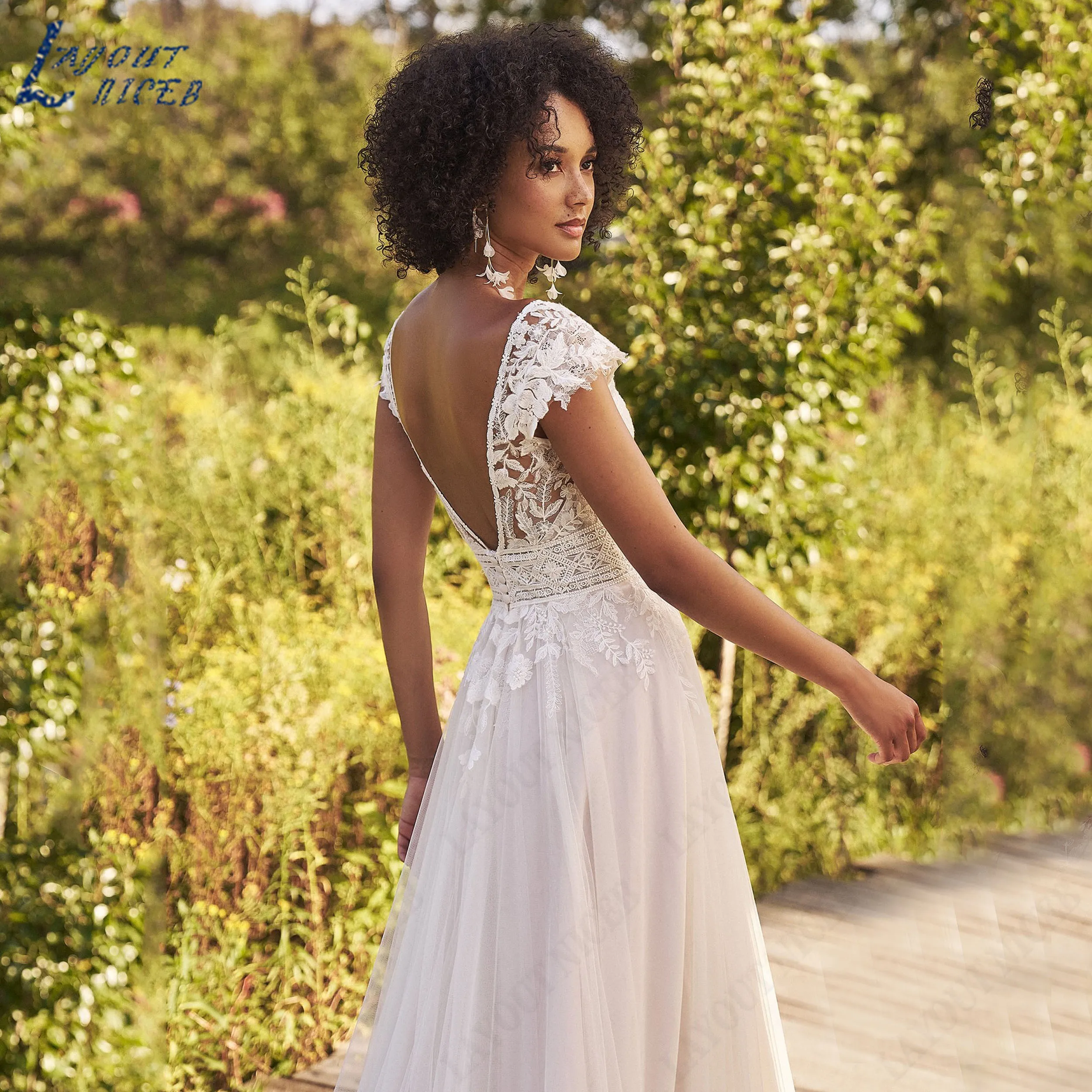 LAYOUT NICEB Customized Cap Sleeve V-neck Flowy Tulle Bridal Gown Open Back  A Line Lace Applique 2026 Wedding Dress Rustic