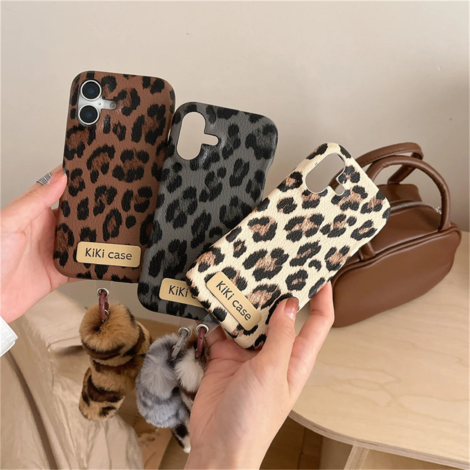 Leopard print leather plush pendant phone case for iPhone 16Promax 15Pro 12pro 13Pro 14Pro light luxury women's anti-drop case