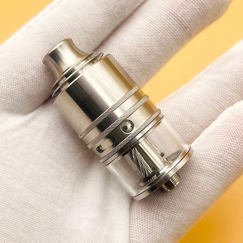 

DSX 2025 Taifun GX Style RDTA 316SS 23 мм 4,0 мл Распылитель бака с одной катушкой и системой боковой наполнения с двумя воздушными дисками 3x1,8 мм