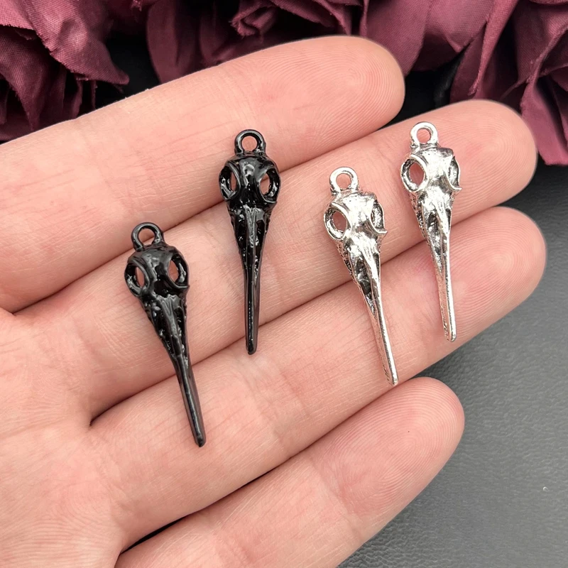 10 sztuk kruk czaszka głowa ptaka urok 35x9mm tybetańskie posrebrzane wisiorki antyczne tworzenia biżuterii DIY Handmade Craft