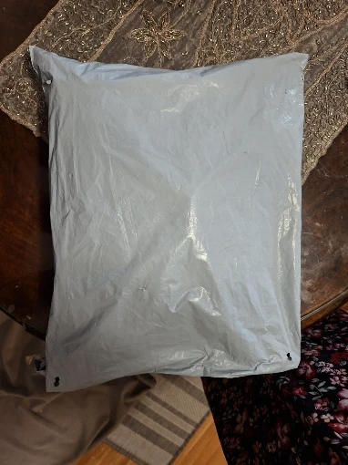Customer review photo for Waterproof Dog Raincoat — Adjustable, Windproof & Hooded