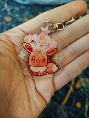 Portachiavi Acrilico con Eevee ed evoluzioni in stile chibi con coroncina