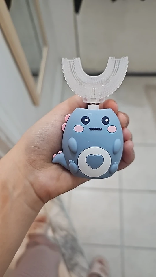 Elektrische Kinderzahnbürste in U-Form Foto-Test