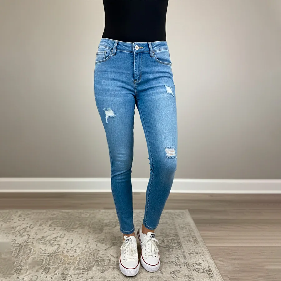 Jeans Skinny de Tiro Alto con Destrucción Estratégica – Ajuste Perfecto