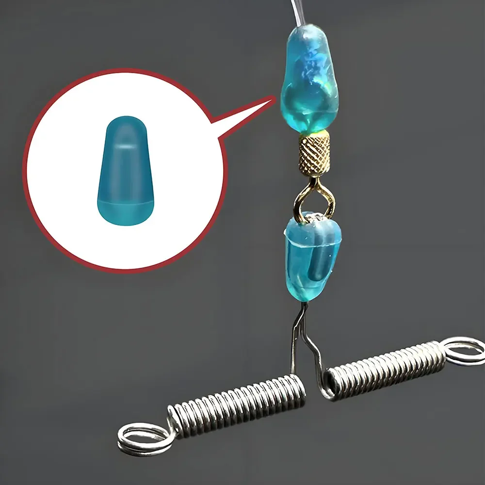 100 pièces/lot caoutchouc espace haricots mer carpe pêche à la mouche haute qualité bleu caoutchouc ovale bouchon pêche flotteur pêche Bobber outils