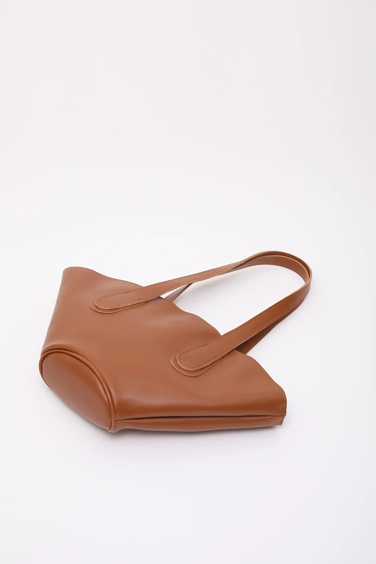 

Tan Faux Leather, Lined, Zippered, Single Compartment Hand, Arm and Shoulder Bag