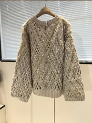 Exquisitely trimmed classic cashmere sweater of high quality