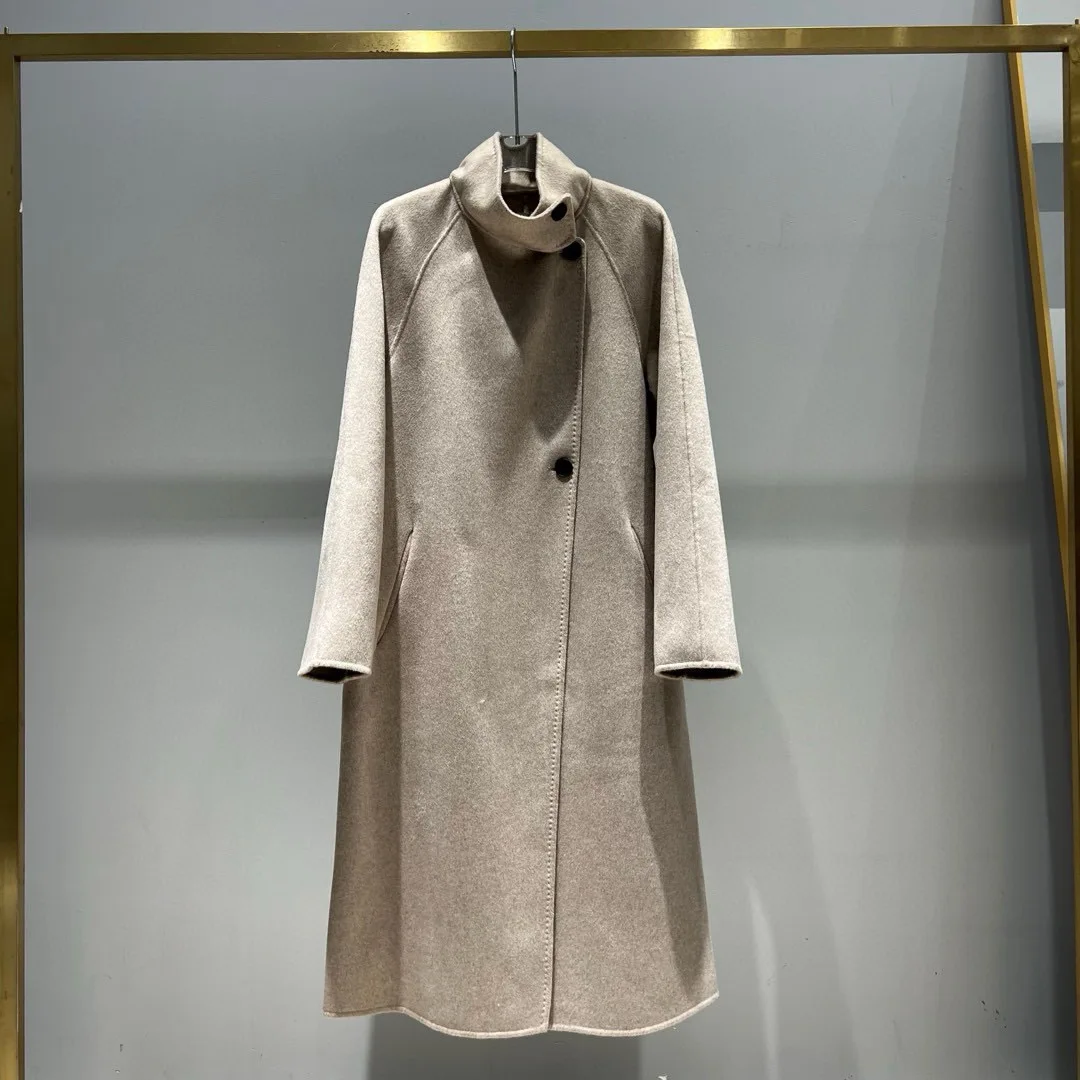 Elegant women's coat with a high collar