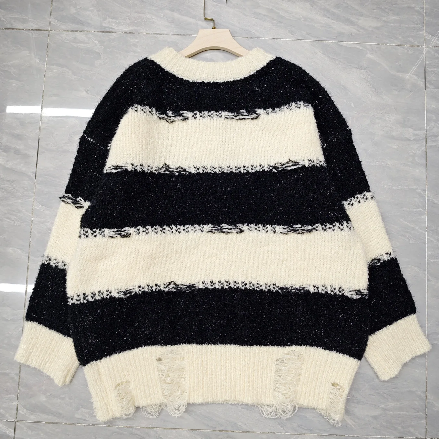 

Women's Black & White Striped Distressed Knit Sweater - Unique Details for Elevated Style, Essential for Fall & Winter