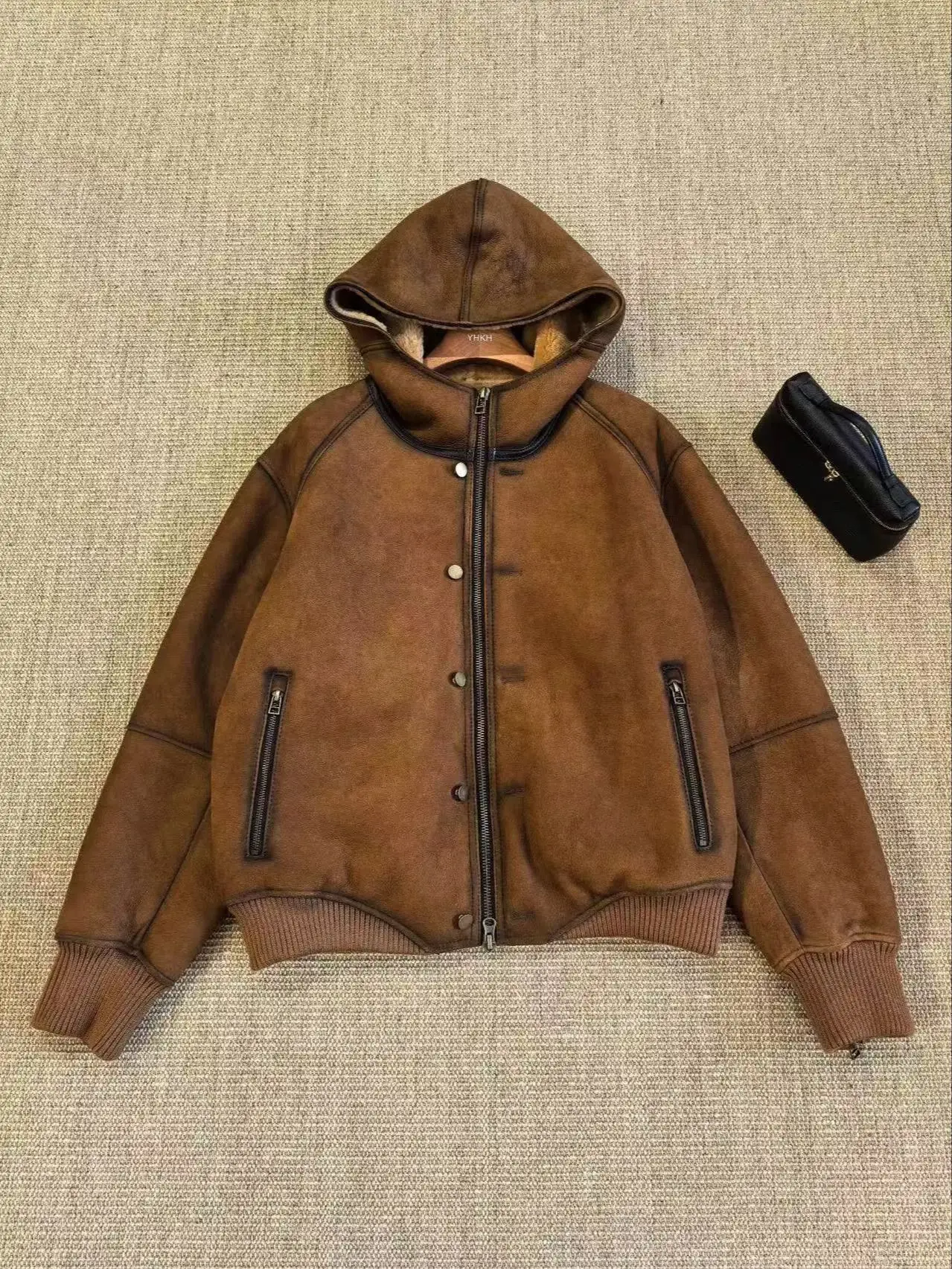 Cappotto retrò alla moda in vera pelle di montone