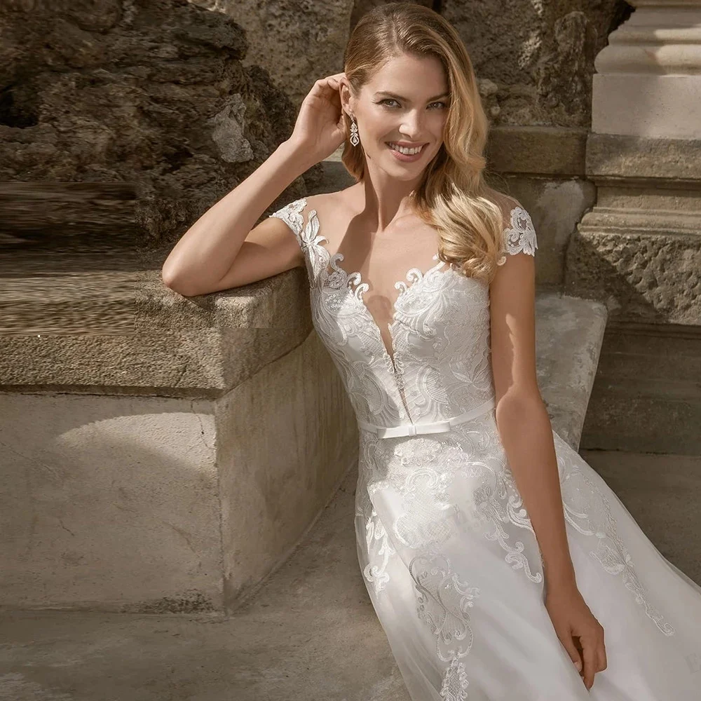 Flamboyance-vestidos de novia acampanados, ropa de novia transparente con cuello redondo, mangas casquillo, Apliques de encaje, tren de barrido,