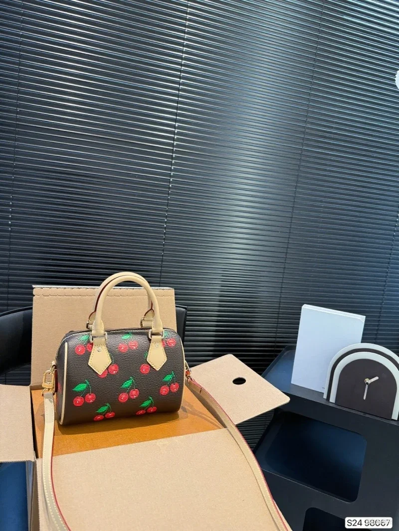 

2025 New and Fashionable Cherry Pillow High-quality and Multifunctional Accessory Handheld Crossbody Printed Bag XM01