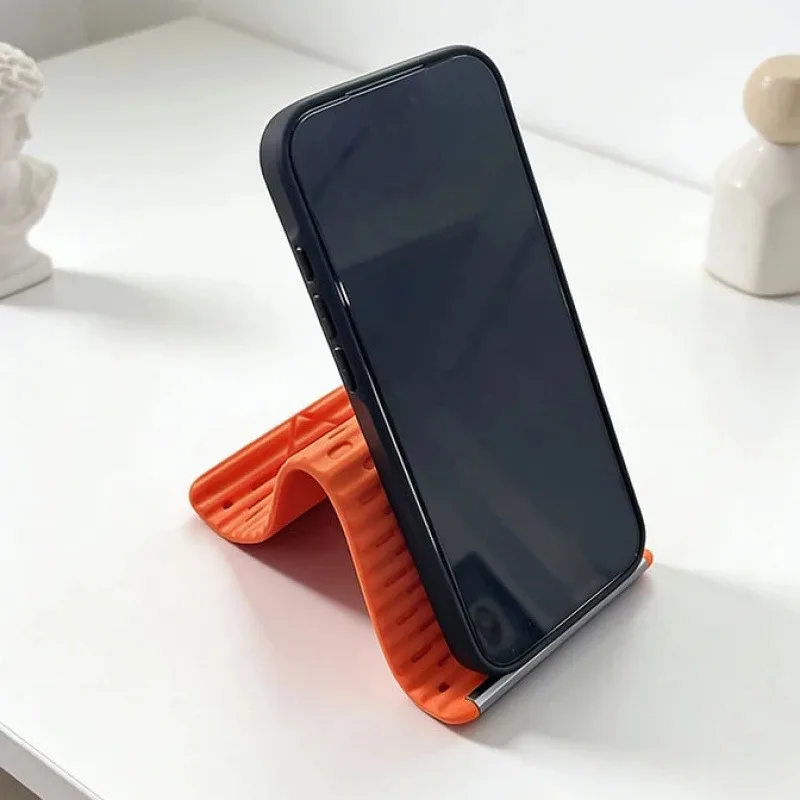 

Foldable Flexible Silicone Phone Stand, Compatible with iPhone 17/16/15, iPad, Tablets and Laptops, Ideal for Desks and Travel, Portable Accessory
