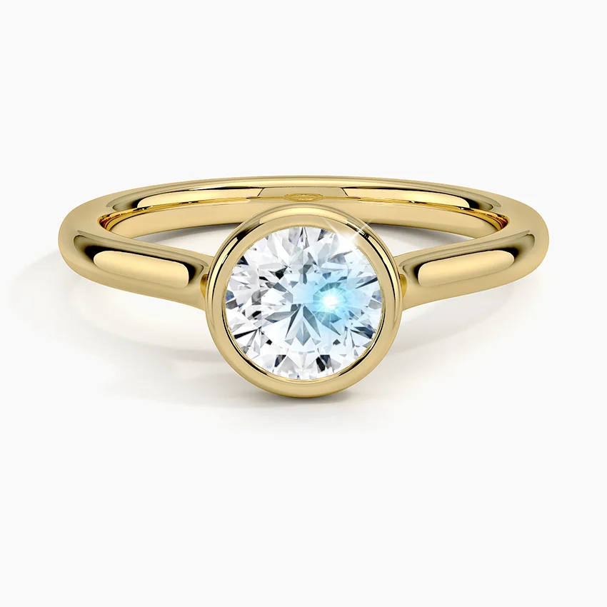 

GEM'S BALLET 1.0CTW 6.5mm Round Moissanite Noemi Bezel Engagement Ring in 18k Gold Plated 925 Sterling Silver